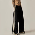 Black men's wide-leg climbing trousers with high waist and straight cut in polyester fabric