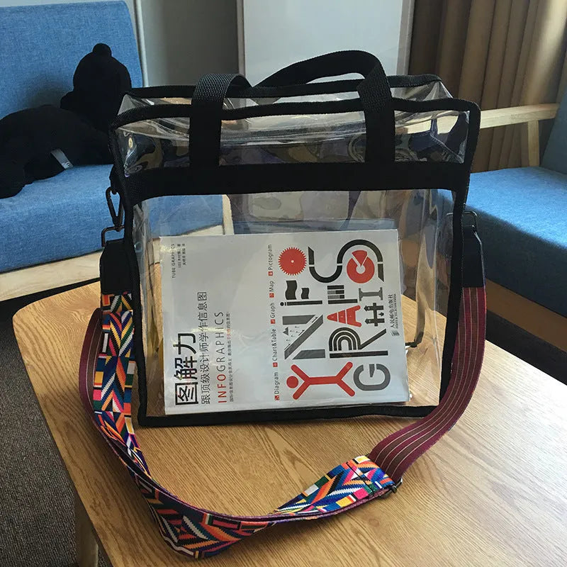 Women's PVC messenger bag with transparent front compartment and crossbody strap in a selection of colours.