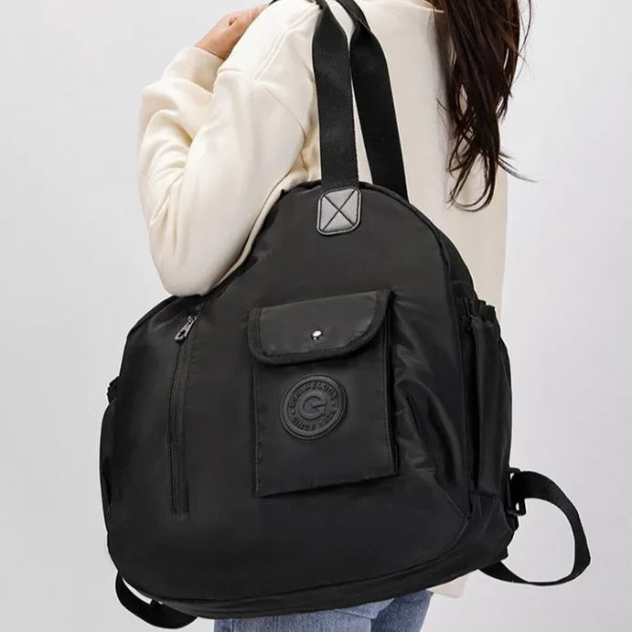Women's large capacity backpack showing sandwich pocket design and 48cm height dimensions
