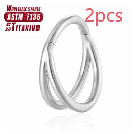 Titanium alloy nose ring in silver, available in plain or diamond-set styles and multiple lengths.