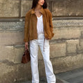 Retro solid colour loose fit polyester jacket on a hanger, shown in picture colour.