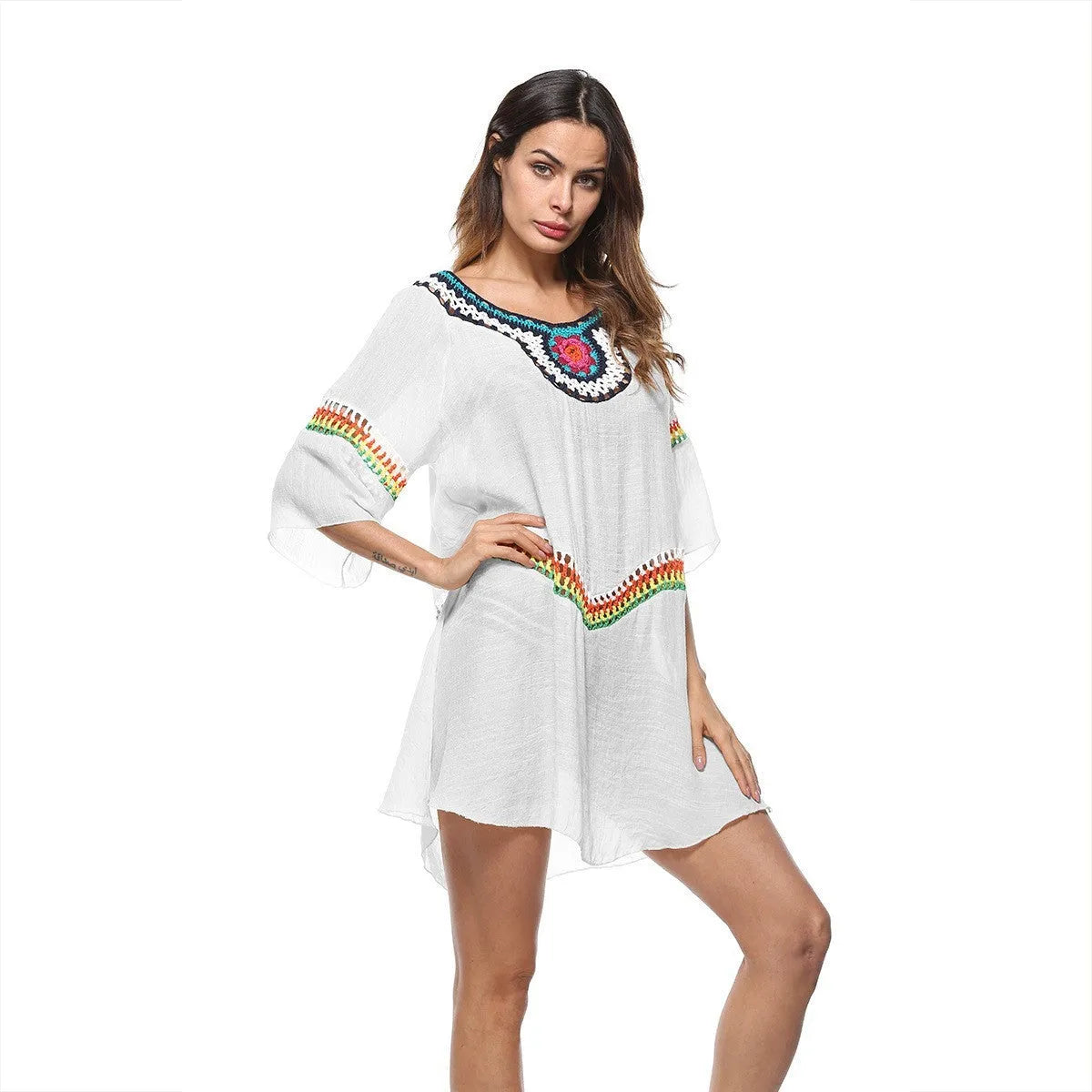 Crocheted ethnic style women's sun protection clothing in apricot colour for beach wear.