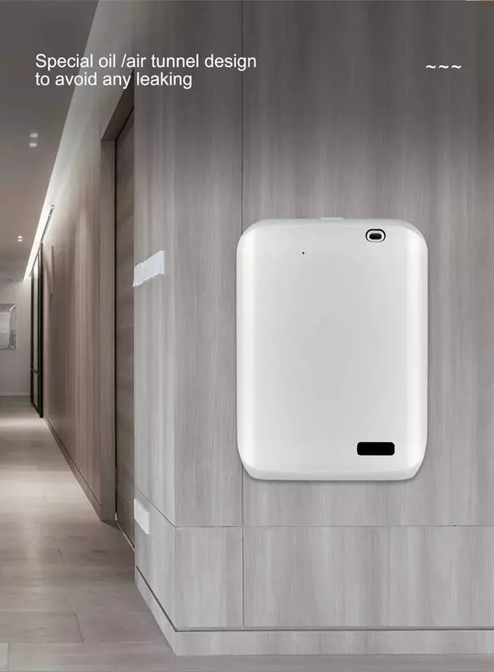 White wall mount smart essential oil diffuser with app control and 150ml capacity.
