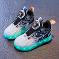 Children's striped roller skates with rotating button closure in blue, black, and pink colour options