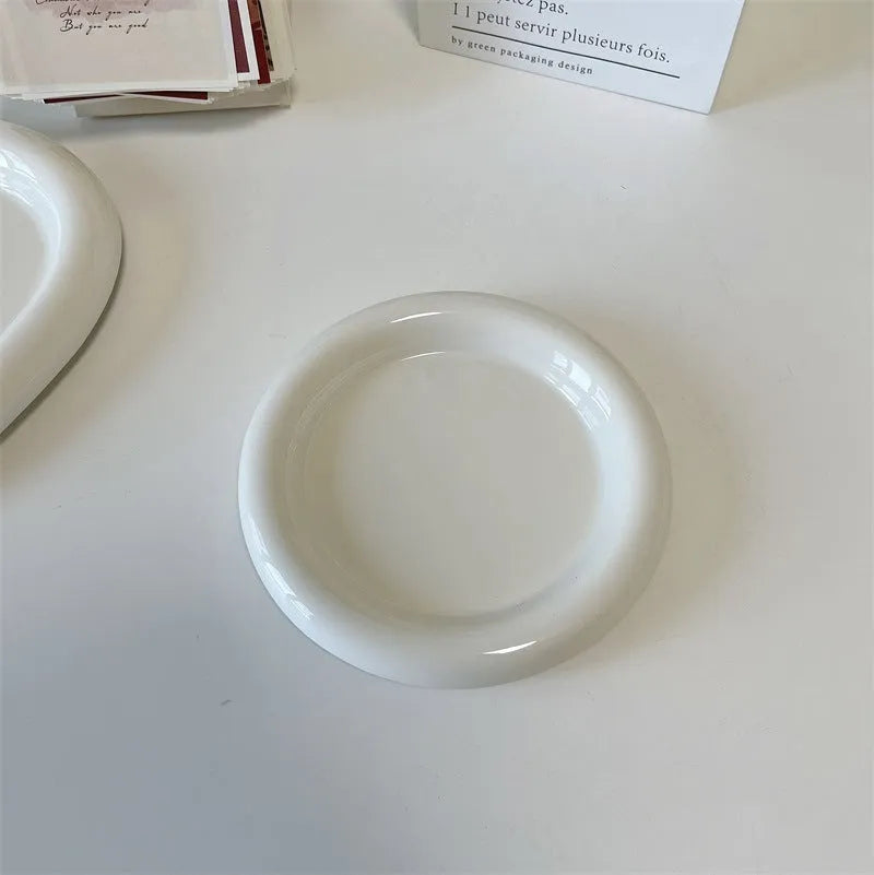 White porcelain chubby toot plate with bear doodle design, suitable for microwave use
