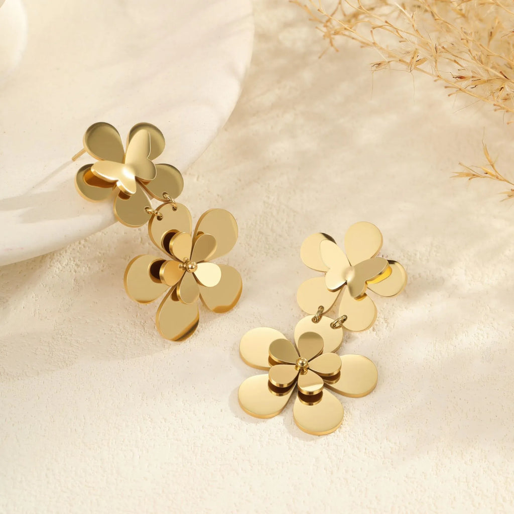 Gold electroplated stainless steel earrings with flower and butterfly designs for women