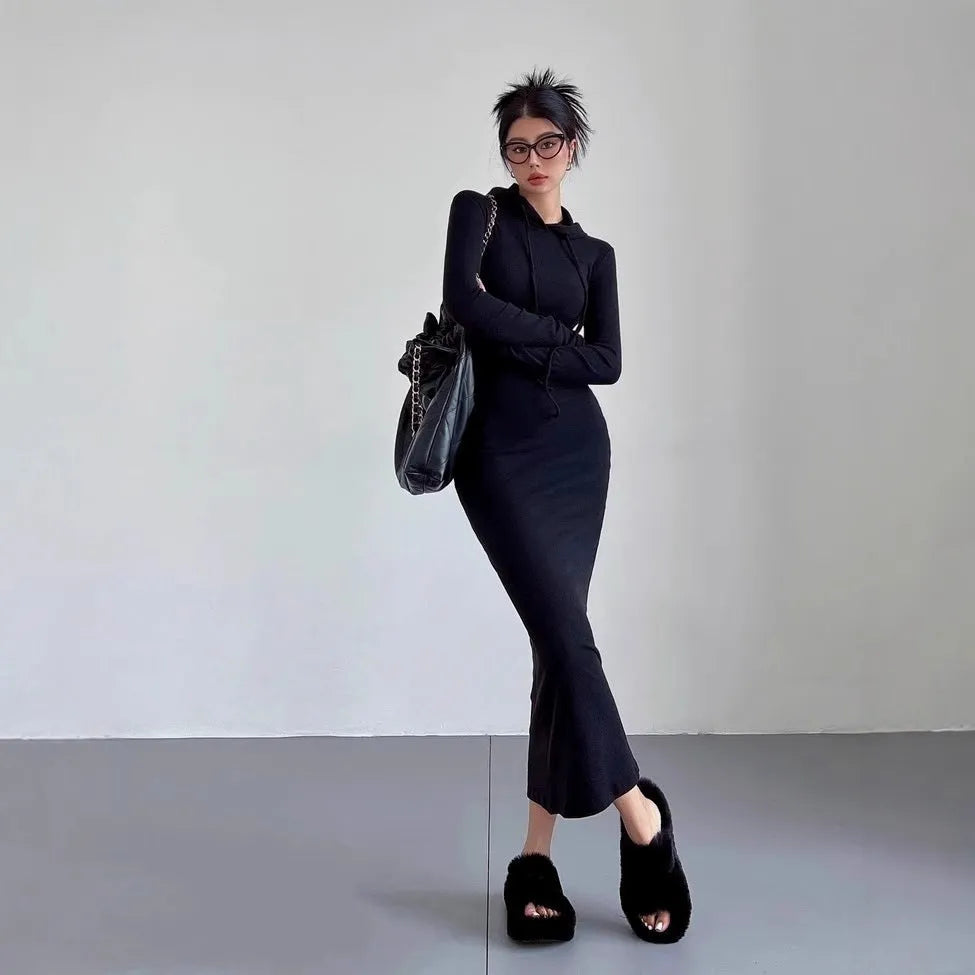 Women's long sleeve hooded sheath dress in grey with over-the-knee length and high waist.