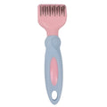 Pink pet grooming comb with stainless steel knot knife, massage brush head, and comb teeth on a white background.