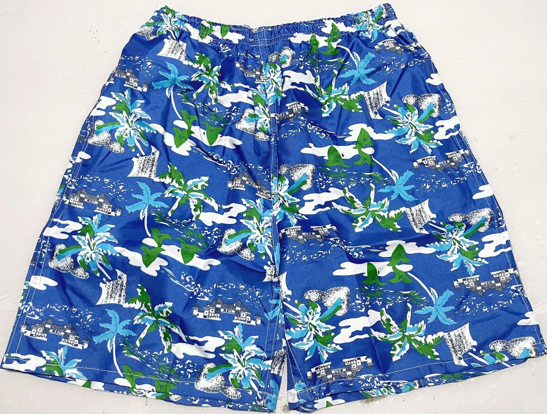 Men's floral print swimming trunks in multiple colour variations for pool and beach wear