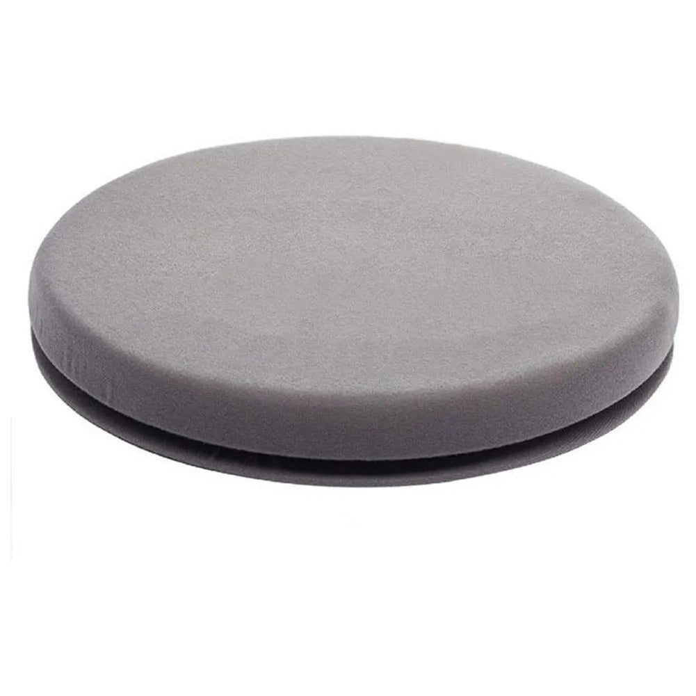 360-degree rotating car seat cushion with non-slip base showing plush cloth cover and circular shape