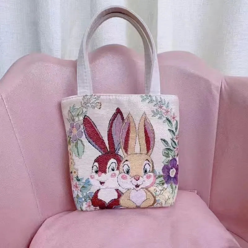 Double-sided gold wire embroidered canvas tote bag in small, medium, and large sizes with floral patterns.