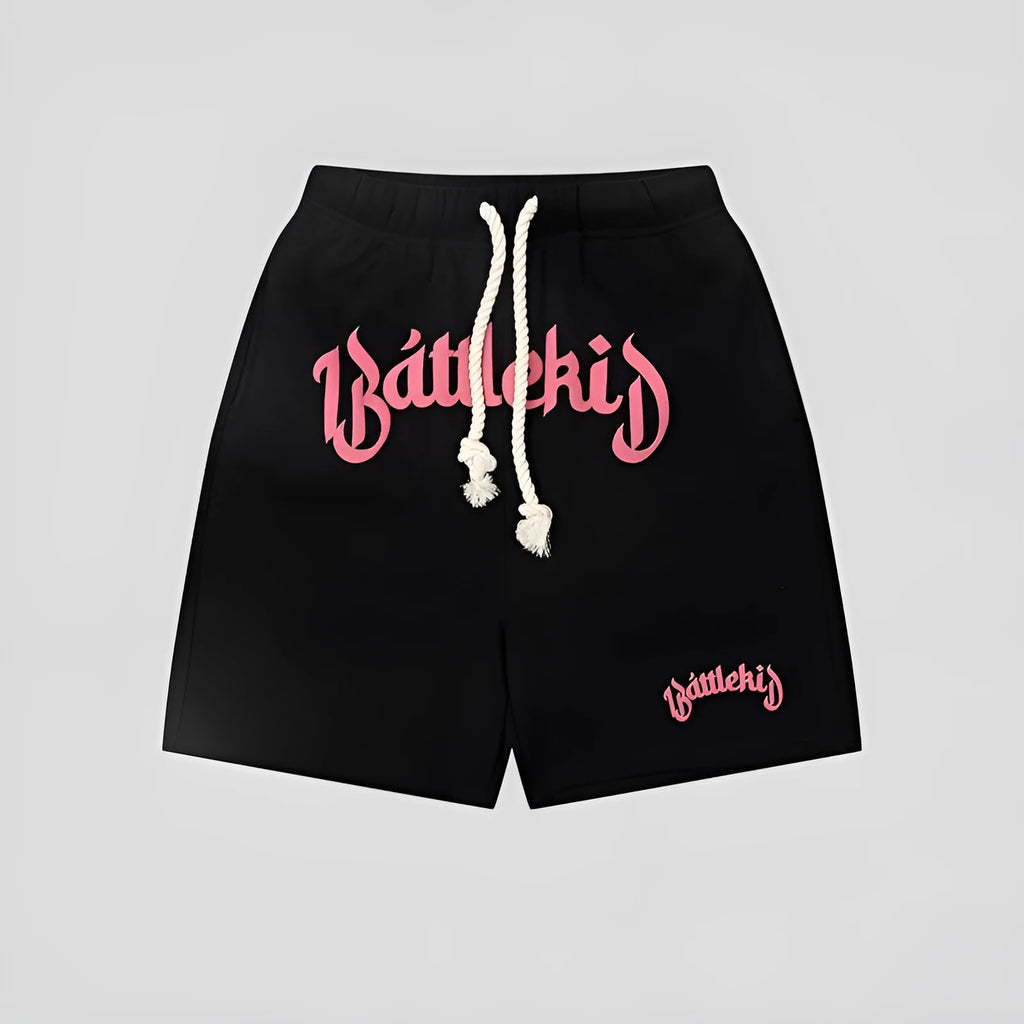 A pair of loose-fit black hip hop shorts made from cotton blend fabric on a mannequin.