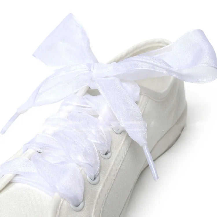 Wide 4cm transparent silk shoelaces in beige, black, and wine red colours, showing length.