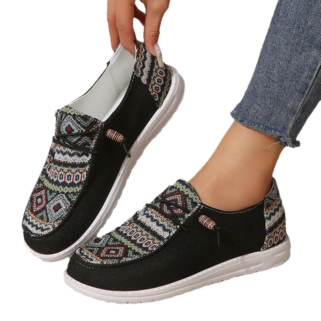 Women's flat round toe low-top shoes in black, dark grey, and khaki colours