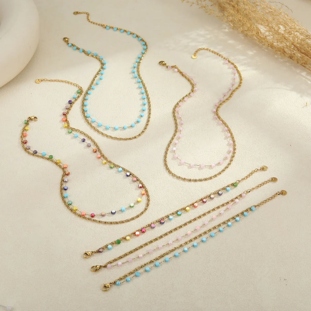 Colorful beaded stainless steel gold-plated double layer clavicle necklace for women on white background