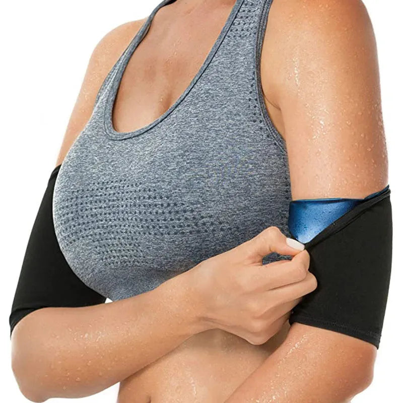 Blue and silver sports arm sweatband shown on an arm, with packaging showing black and red colour option.