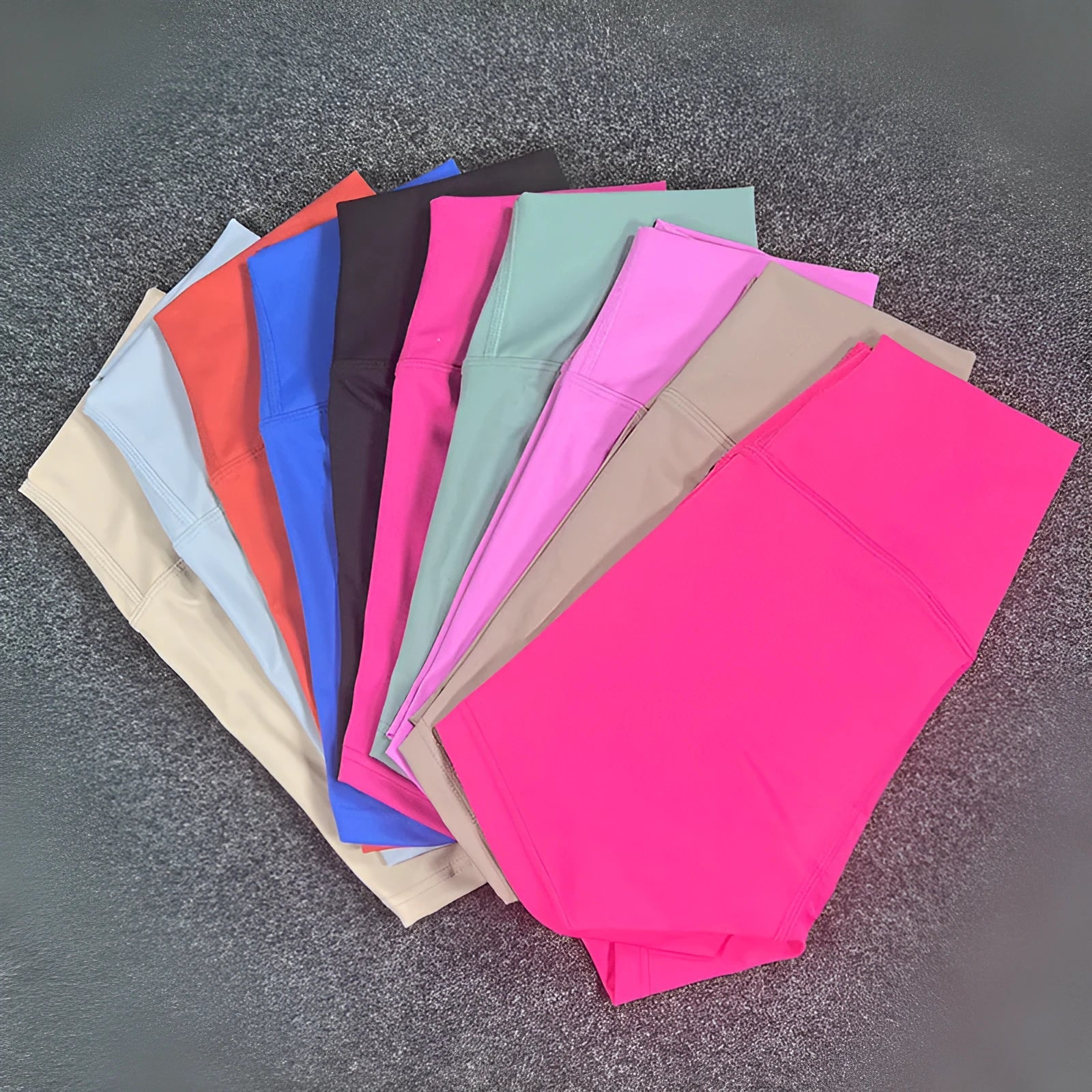 Women's high-waisted nylon yoga shorts in various colours suitable for running, sports, and cycling