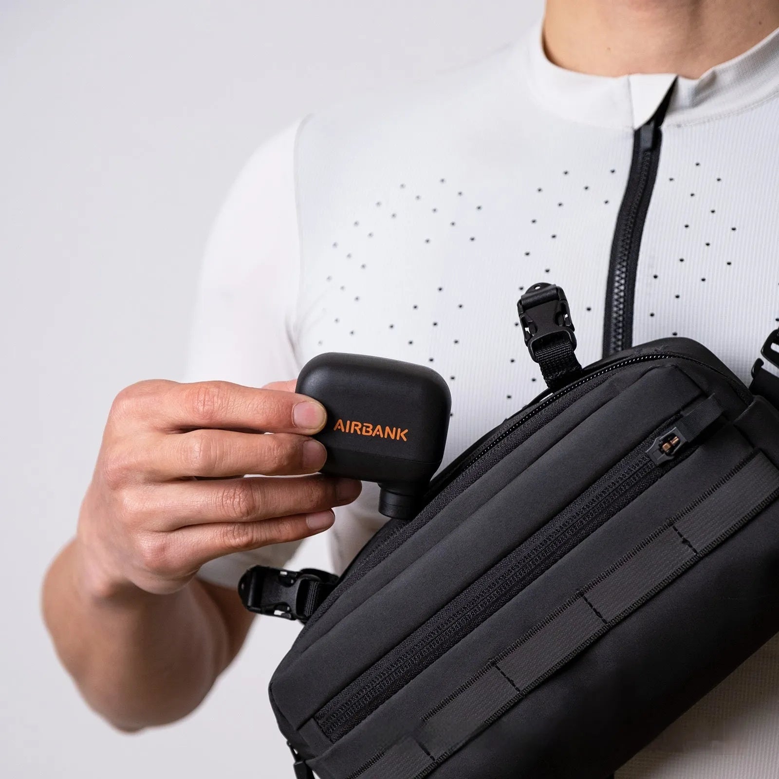 Black AS100 mini electric bike pump with USB cable and waterproof storage bag