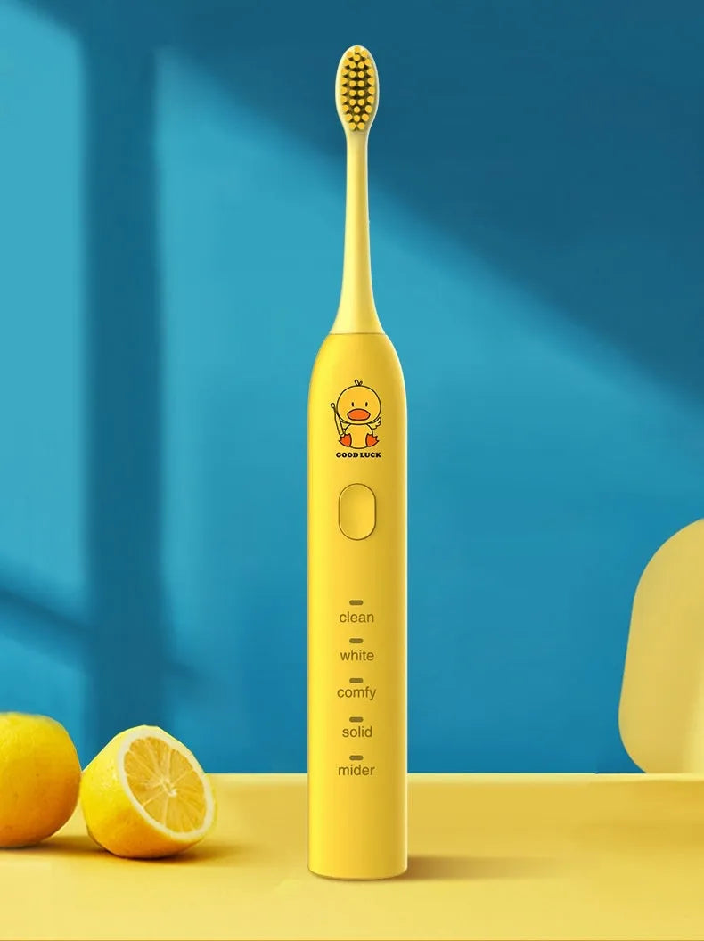 Small yellow duck USB rechargeable electric toothbrush with soft bristles in yellow colour