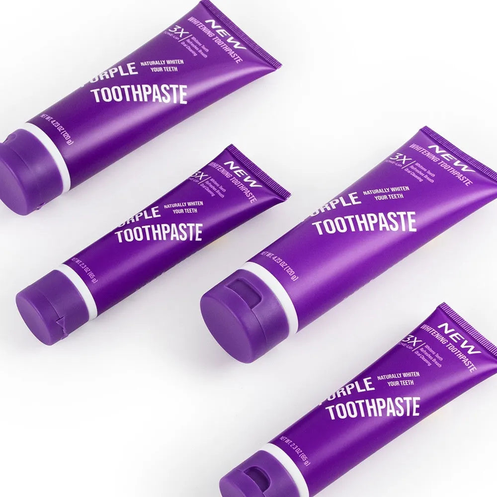 Purple whitening toothpaste tube for adults in 120g and 65g sizes.