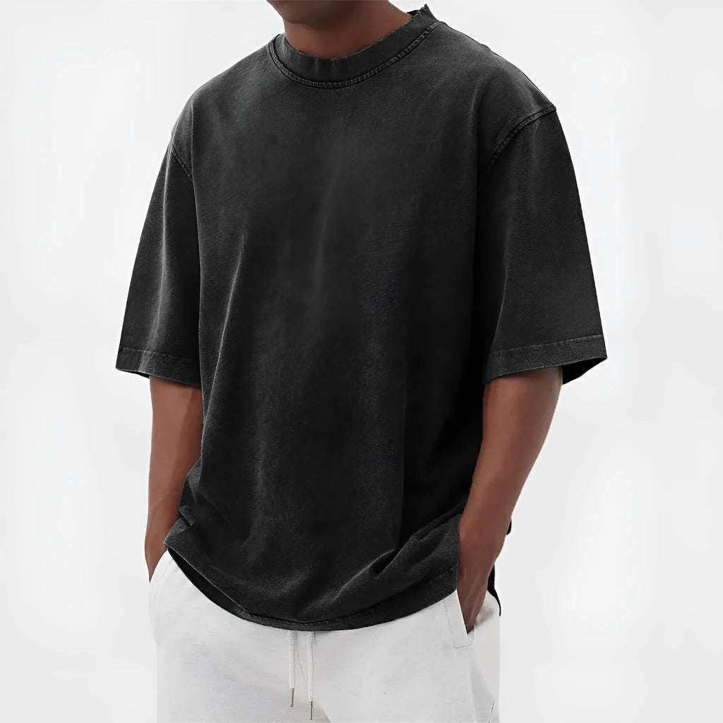 Men's washed distressed pullover t-shirt in solid colour with loose fit and stone washed finish