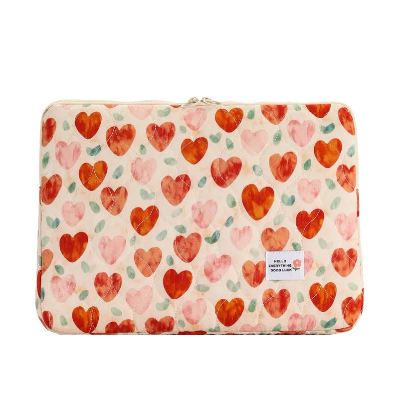 Flower print cloth laptop bag in green floral pattern showing three size options for laptop protection