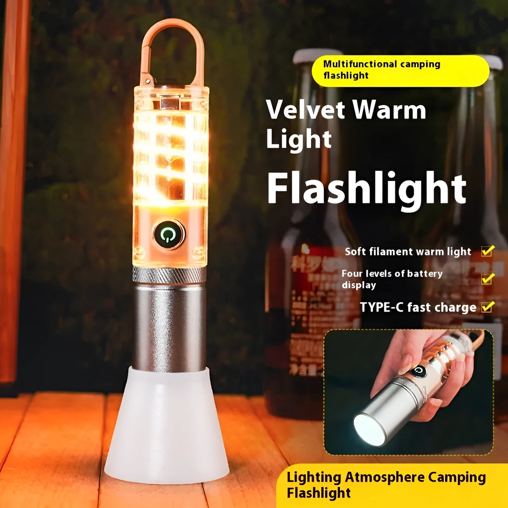 Orange and beige dual light source flashlight with hook and optical zoom ring