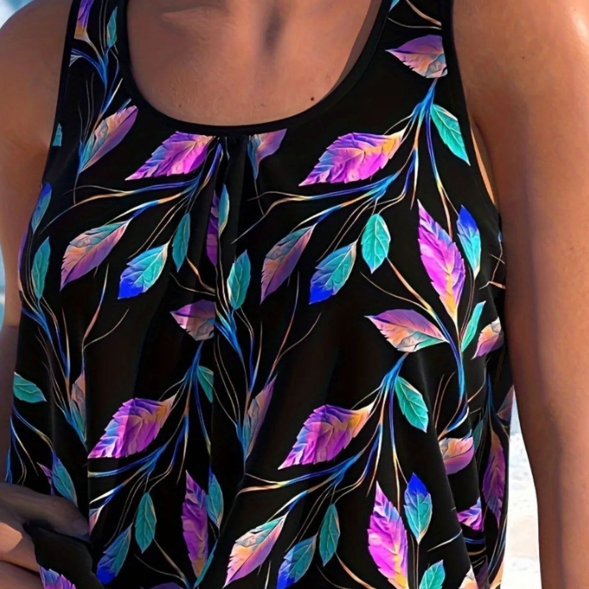 Women's plus-size one-piece leaf design swimsuit with matching shorts in pure colour.