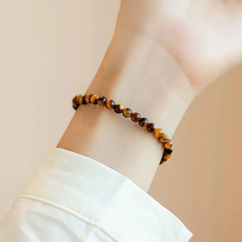 New Chinese style Tigereye bracelet with spherical beads in geometric design.