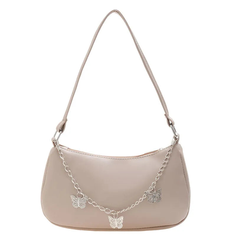 Women's black PU butterfly chain underarm handbag with crossbody strap, shown in a horizontal square shape.