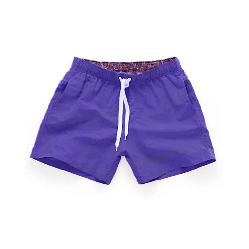 Men's plus size straight-leg beach shorts in multiple colours on a size chart.