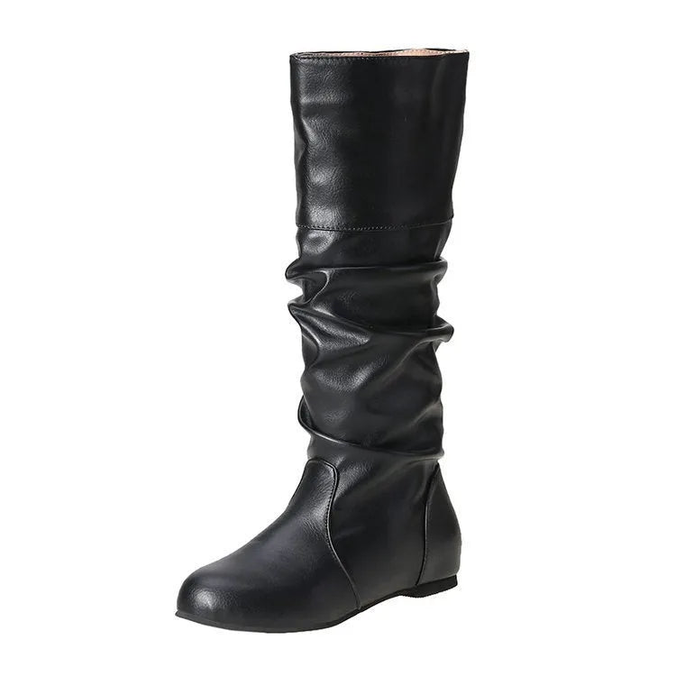 Women's black slip-on flat ankle boots with round toe and rubber sole.