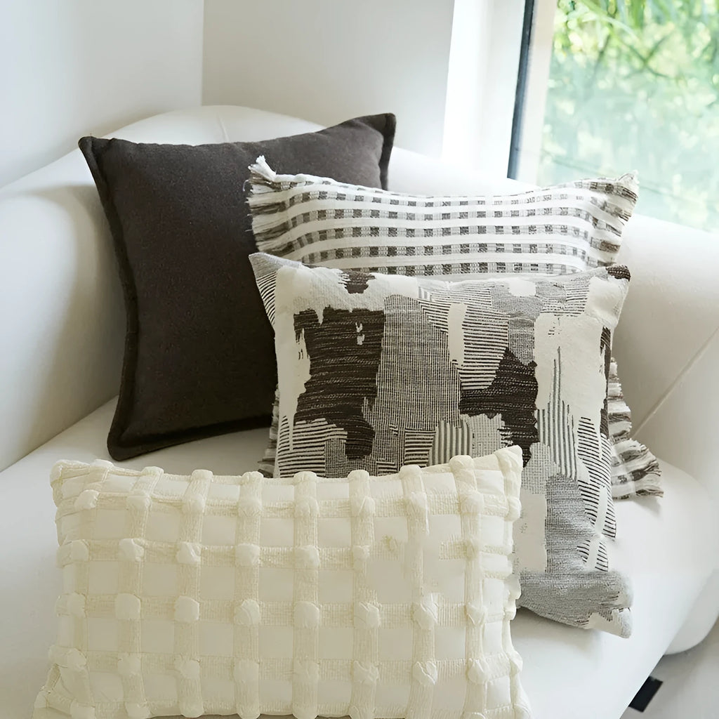 Coffee brown striped Chinese classical style decorative sofa cushion on a grey sofa.