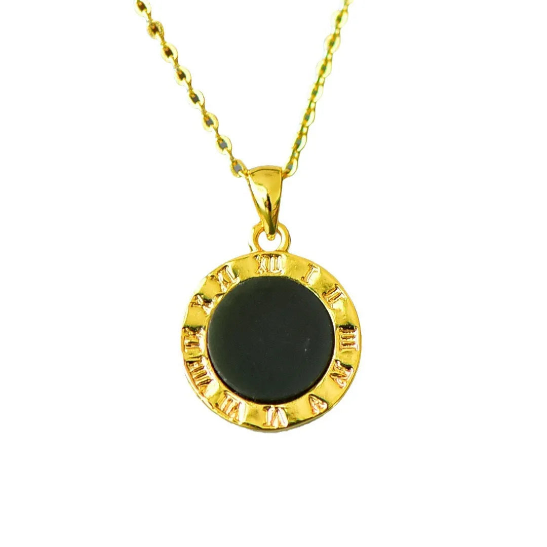 Flat minimalist pendant necklace made of ink blue Hetian grey jade with decorative copper inlay detail.