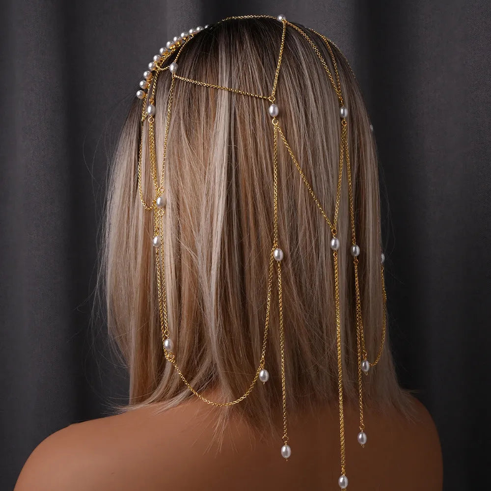 Women's mesh hair chain with electroplated gold finish, pearl elements, and tassel detailing