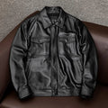 Men's black retro-style PU leather jacket with side pockets shown on a model, plus size loose fit.