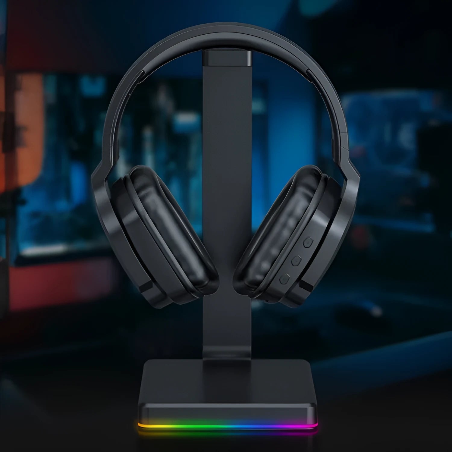 Luminous black wireless over-ear headphones with a headband, shown with a 3.5mm audio cable.
