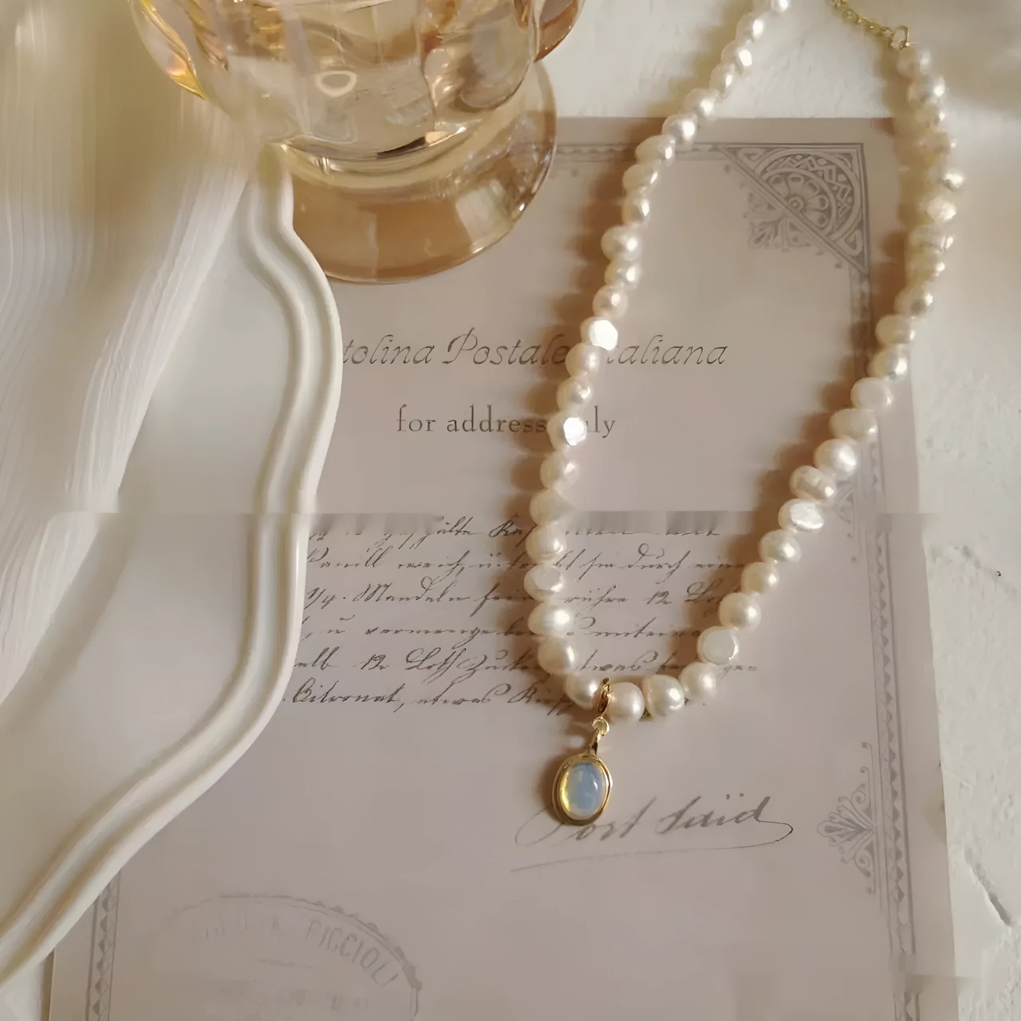 French Court vintage style alloy necklace with geometric pearl pendant on an adjustable chain.
