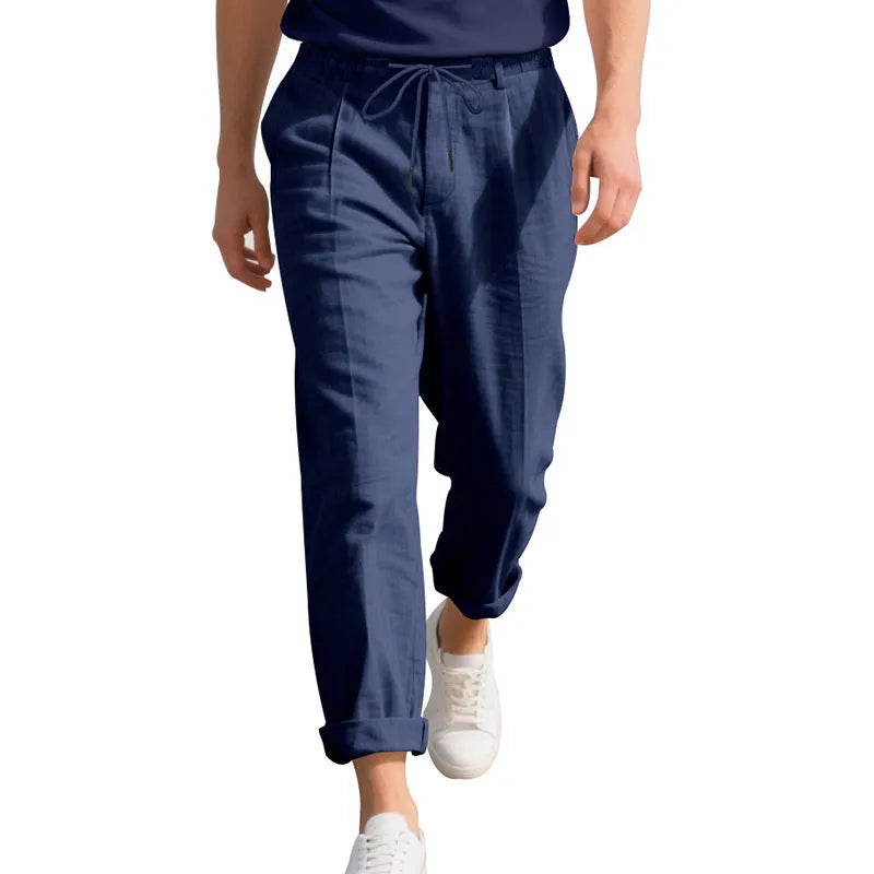Men's casual linen trousers in light khaki colour with drawstring waist and straight leg