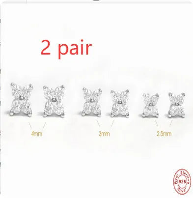 S925 sterling silver stud earrings with small crystal flower petals in gold and platinum finishes.