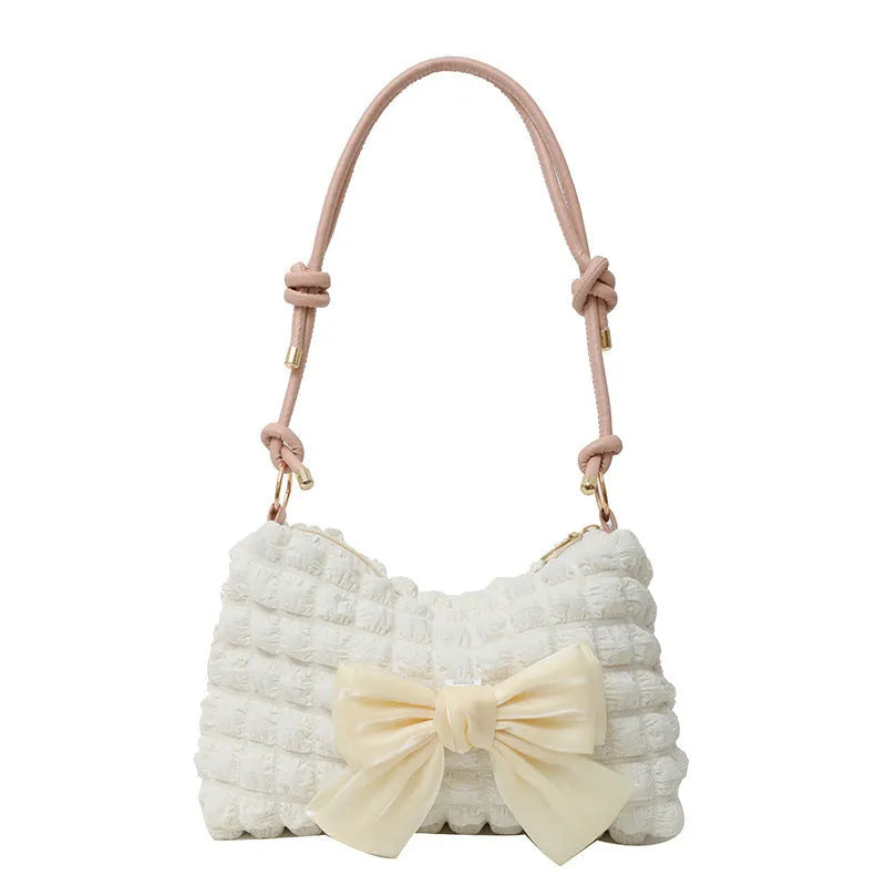 Women's canvas shoulder bag in horizontal square shape with single strap and sandwich pocket