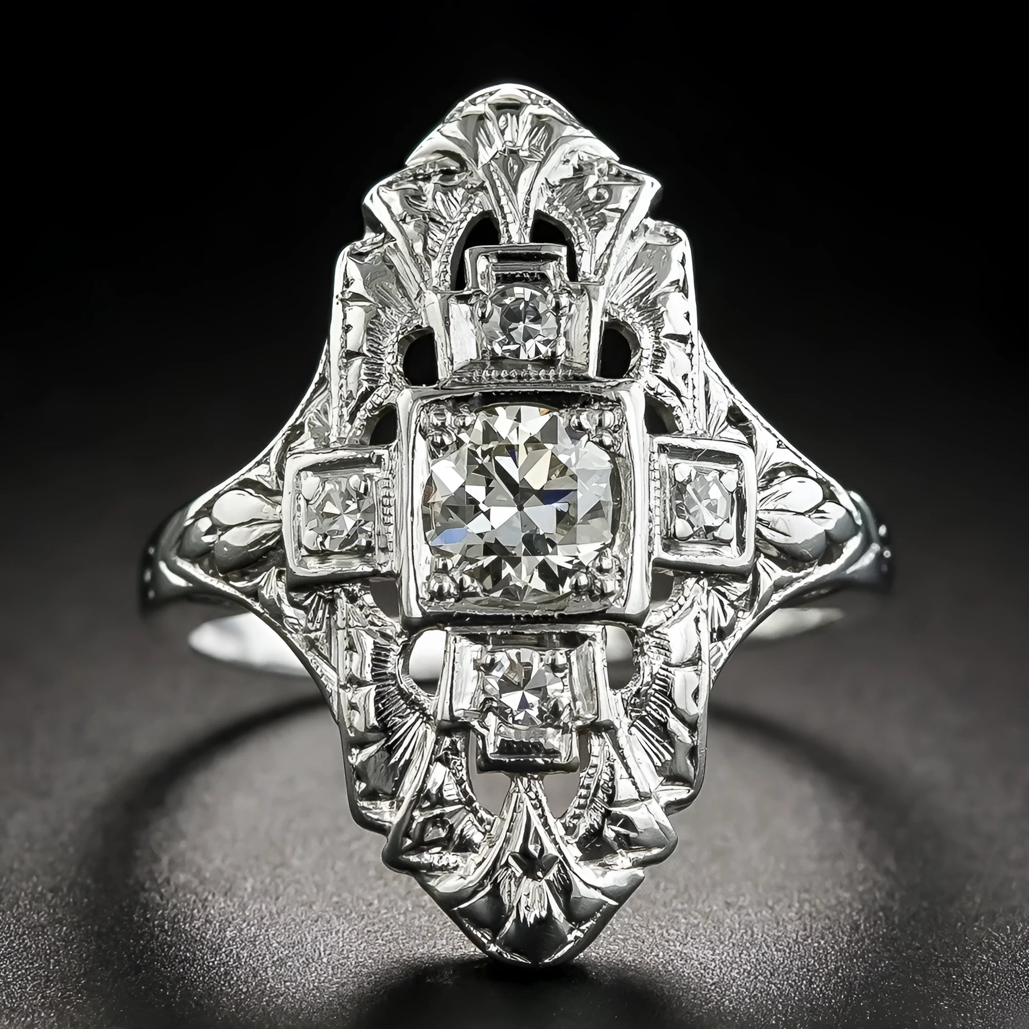 Silver hollow-out geometric ring with diamond-studded accents on copper base