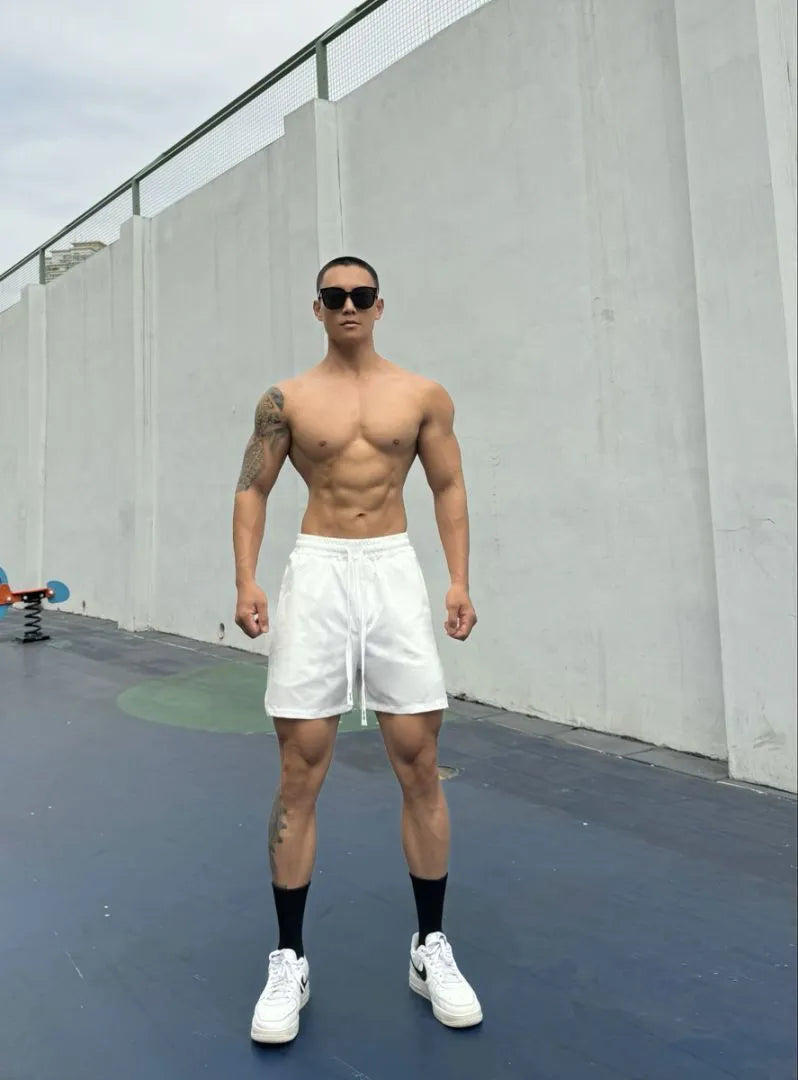 Men's ice silk quick-drying double-layer shorts in six colour options with quarter-length design
