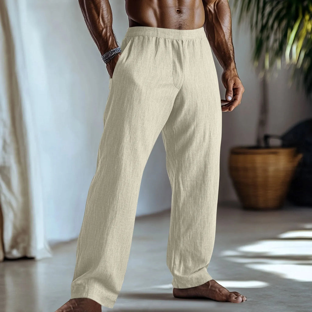 Straight-leg cotton and linen casual trousers in light green colour with visible pockets.