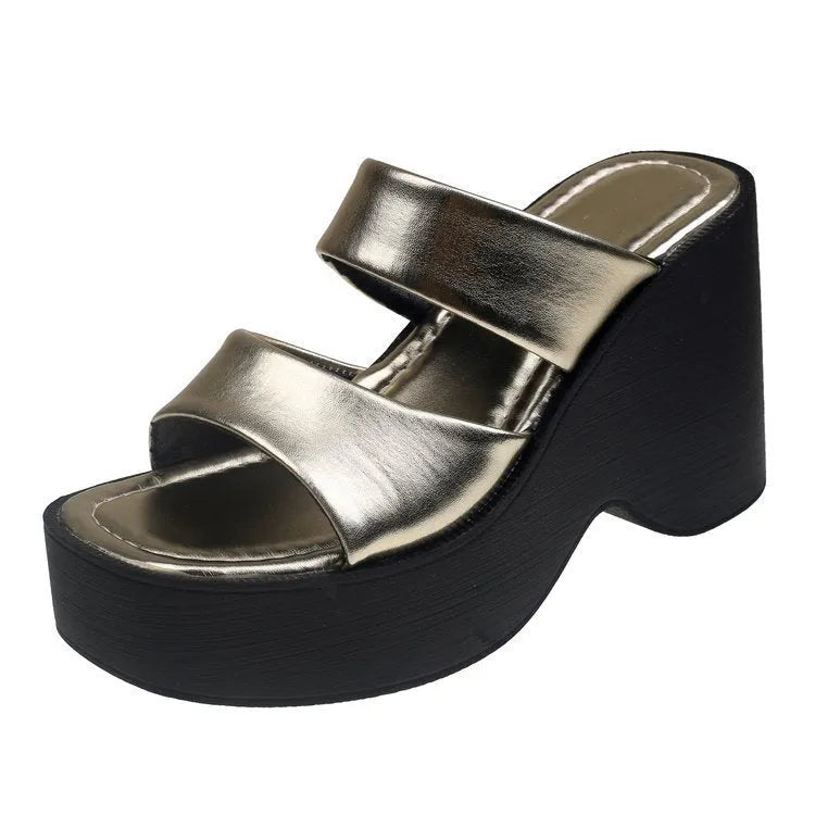 Women's black platform wedge slippers with a square toe design on a white background.