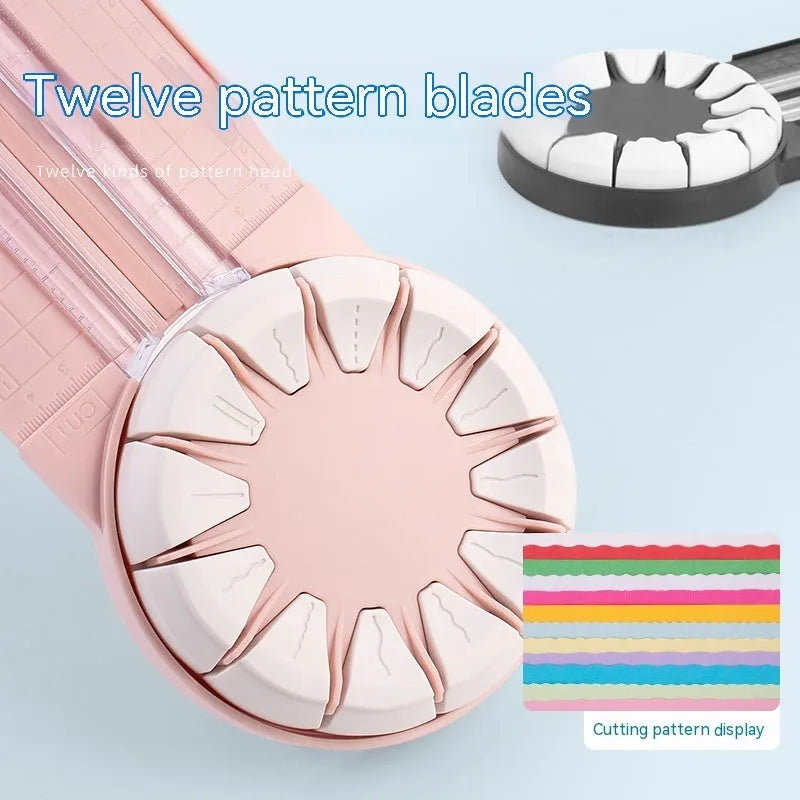 Pink and black plastic paper cutting machine with 12 patterns on desktop
