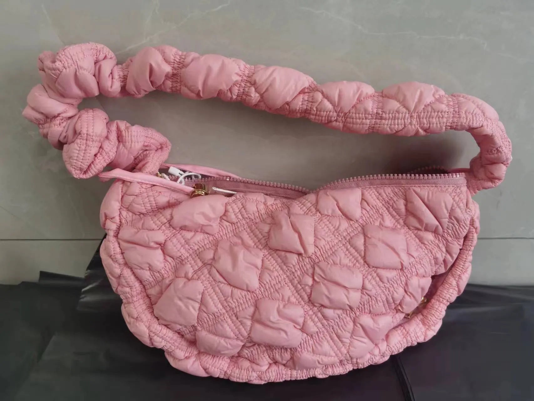 Women's nylon shoulder messenger bag in beige colour showing adjustable strap and dimensions