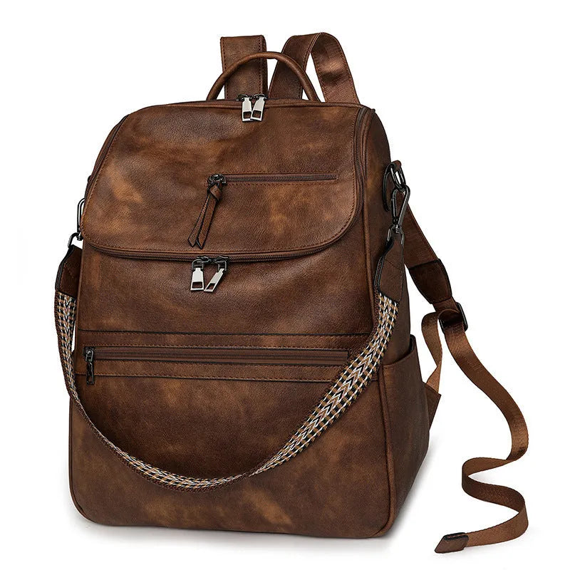 Retro college backpack in black PU leather with curved shoulder straps and stitching details