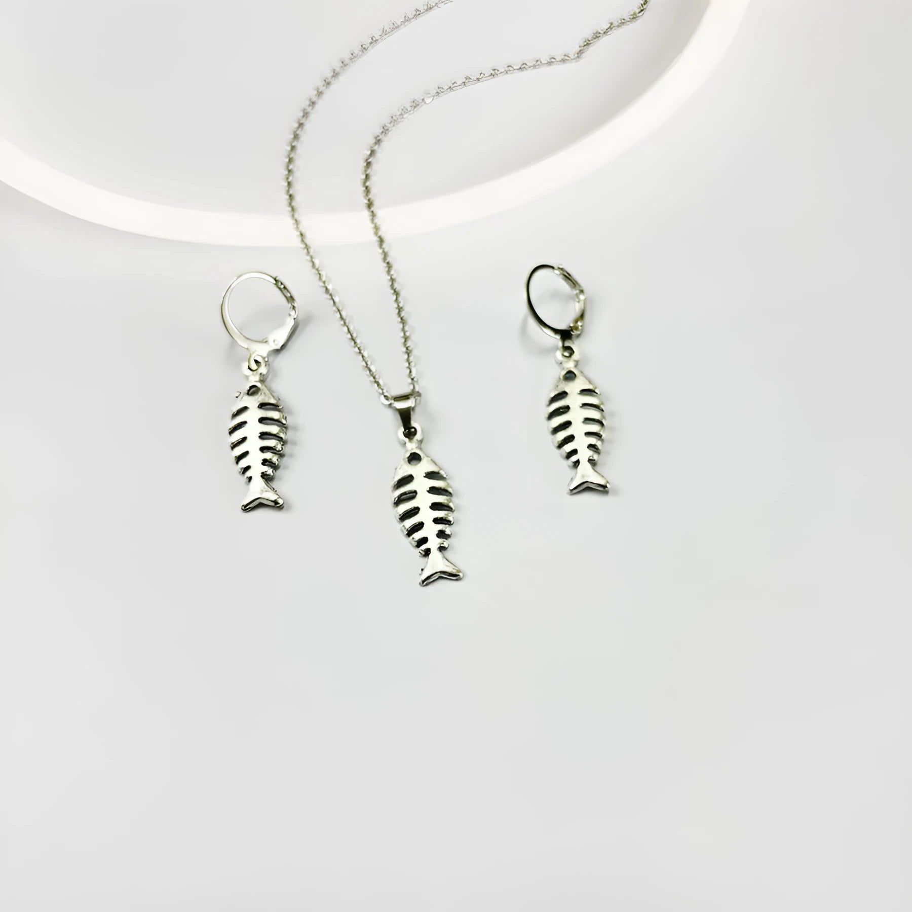 Fishbone pendant necklace and matching earrings set in retro style with adjustable length jewellery