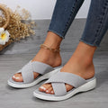 Women's black peep toe wedge slippers with a fish mouth design and thick rubber sole.
